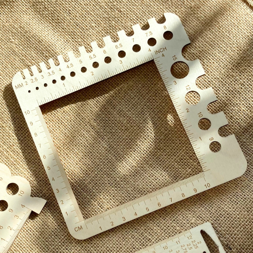Knitting strength frame and needle gauge